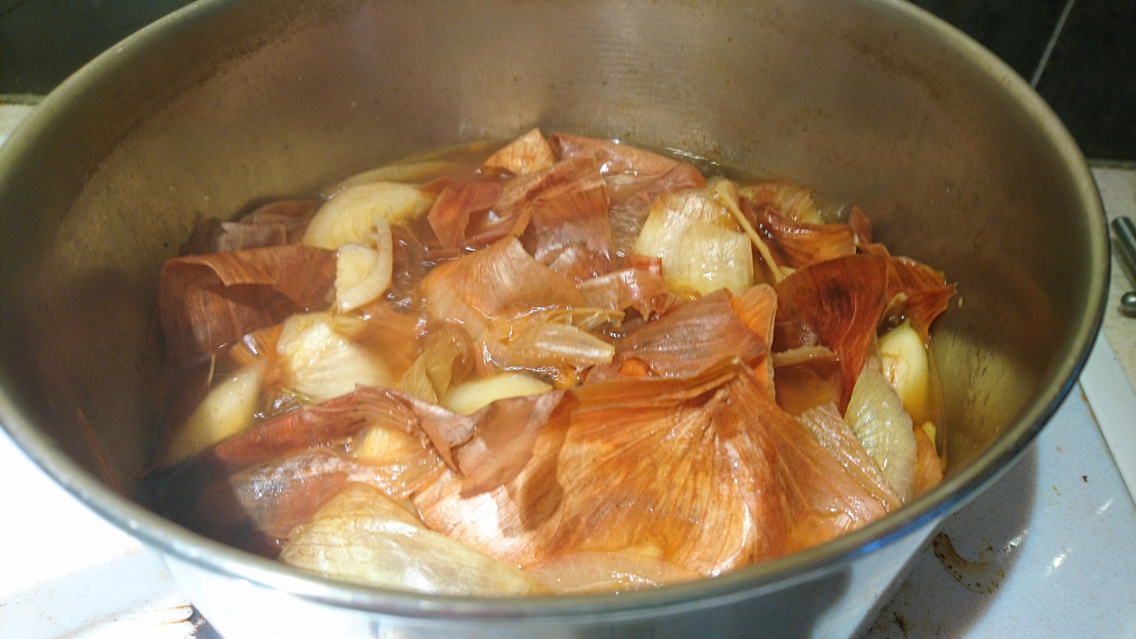brown onion stock on the stove