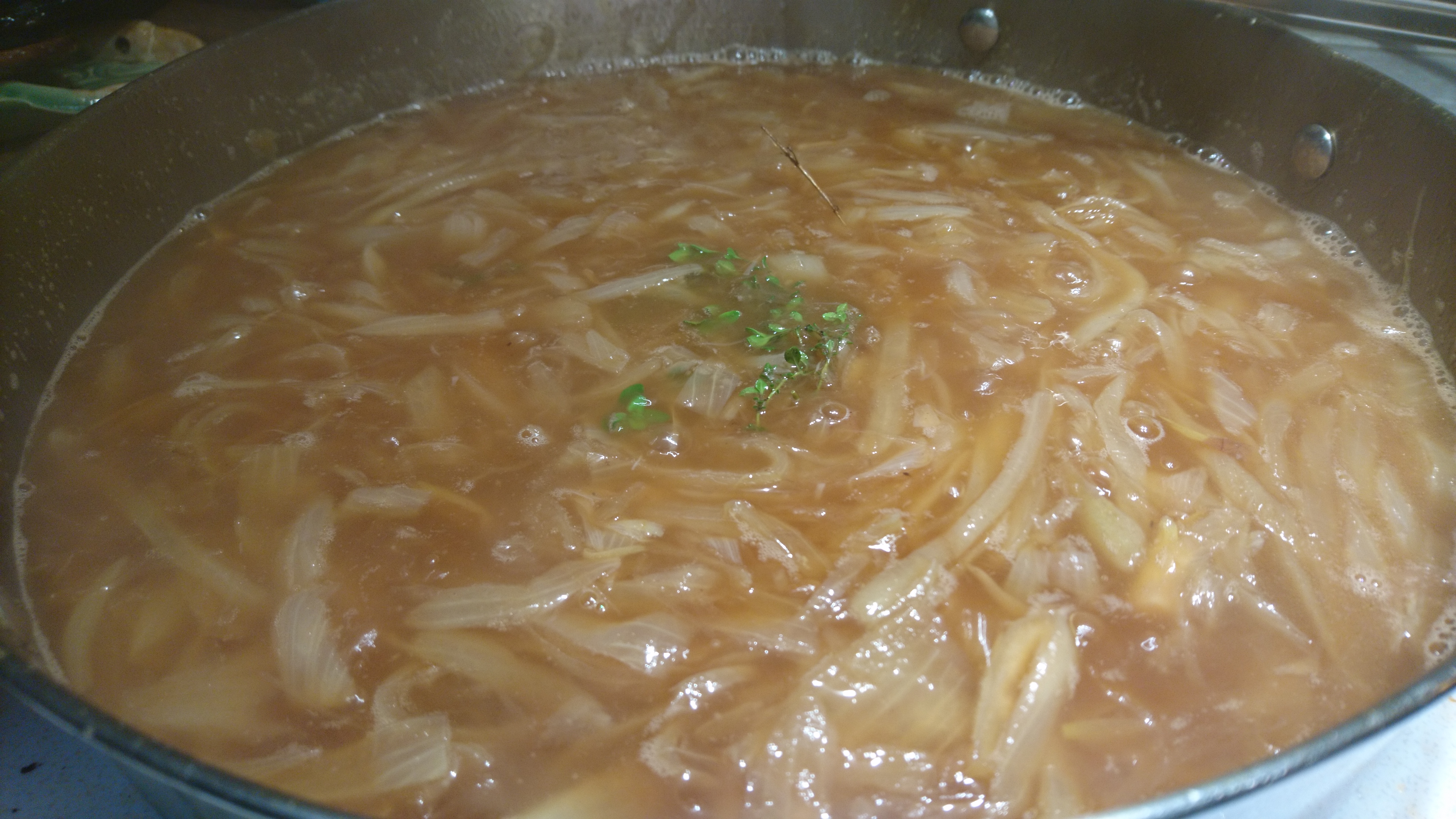 onions and soup mixed in the pan