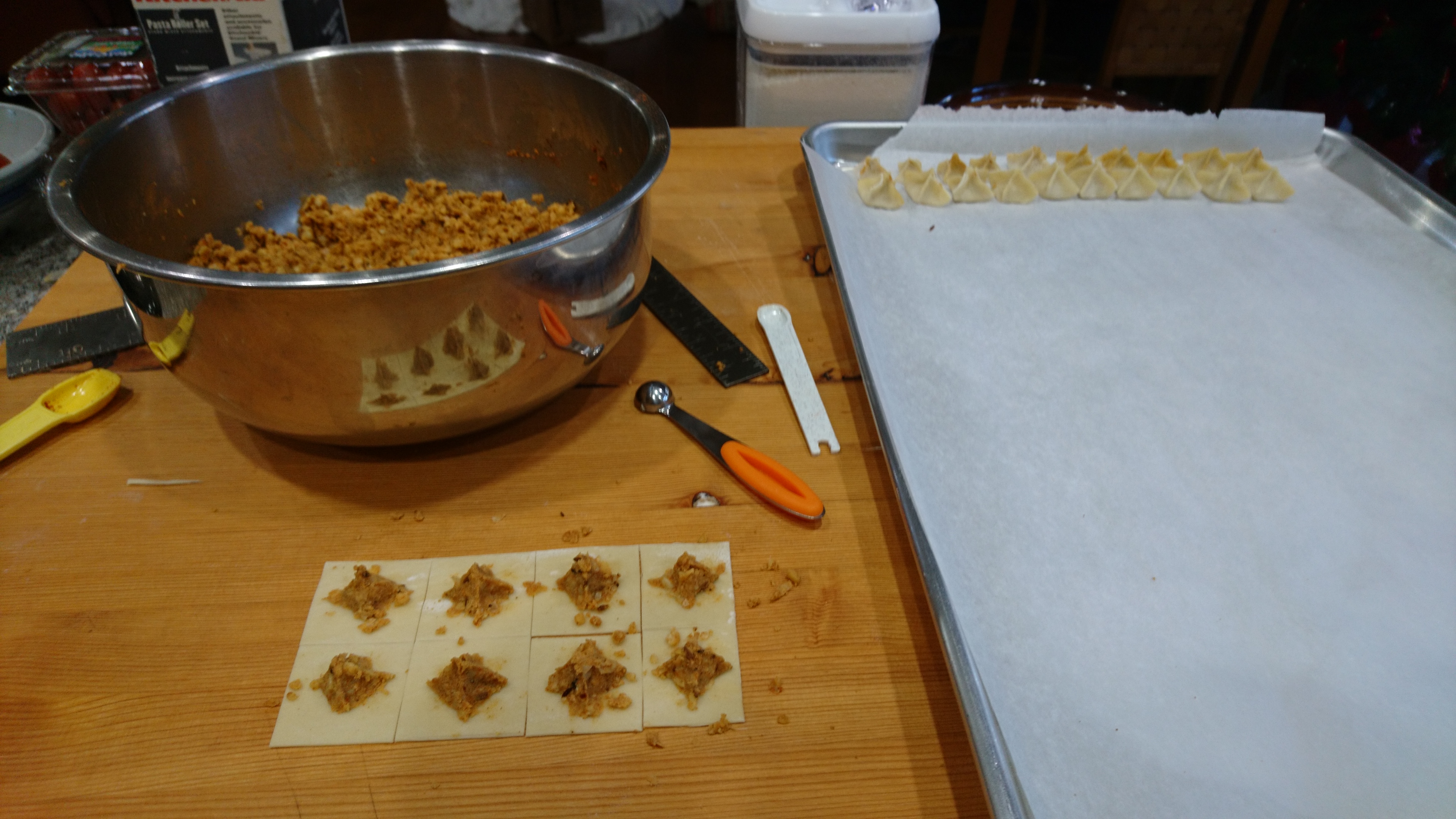 manti wrappers being filled