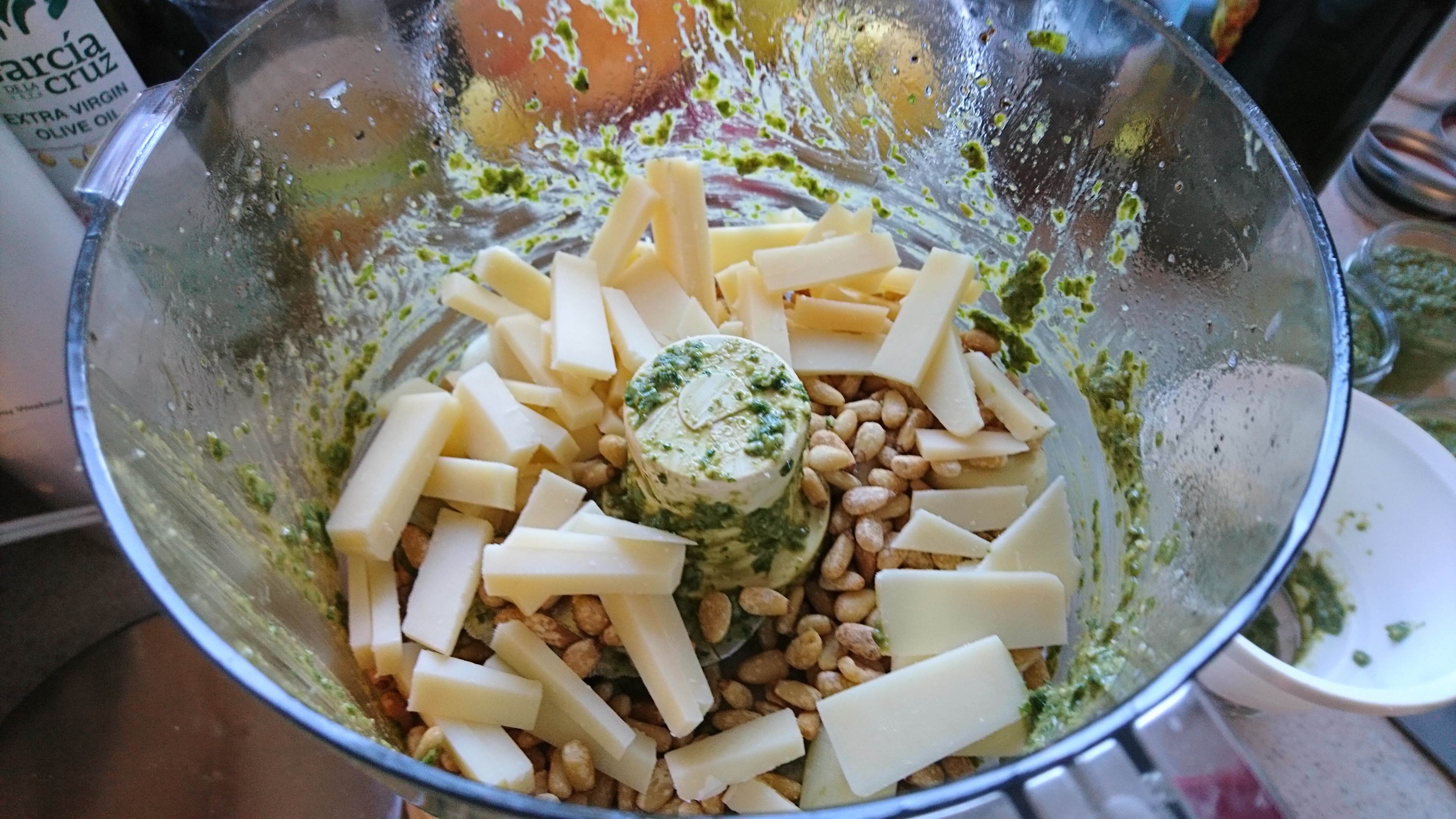 cheese, garlic, and pine nuts in the food processor
