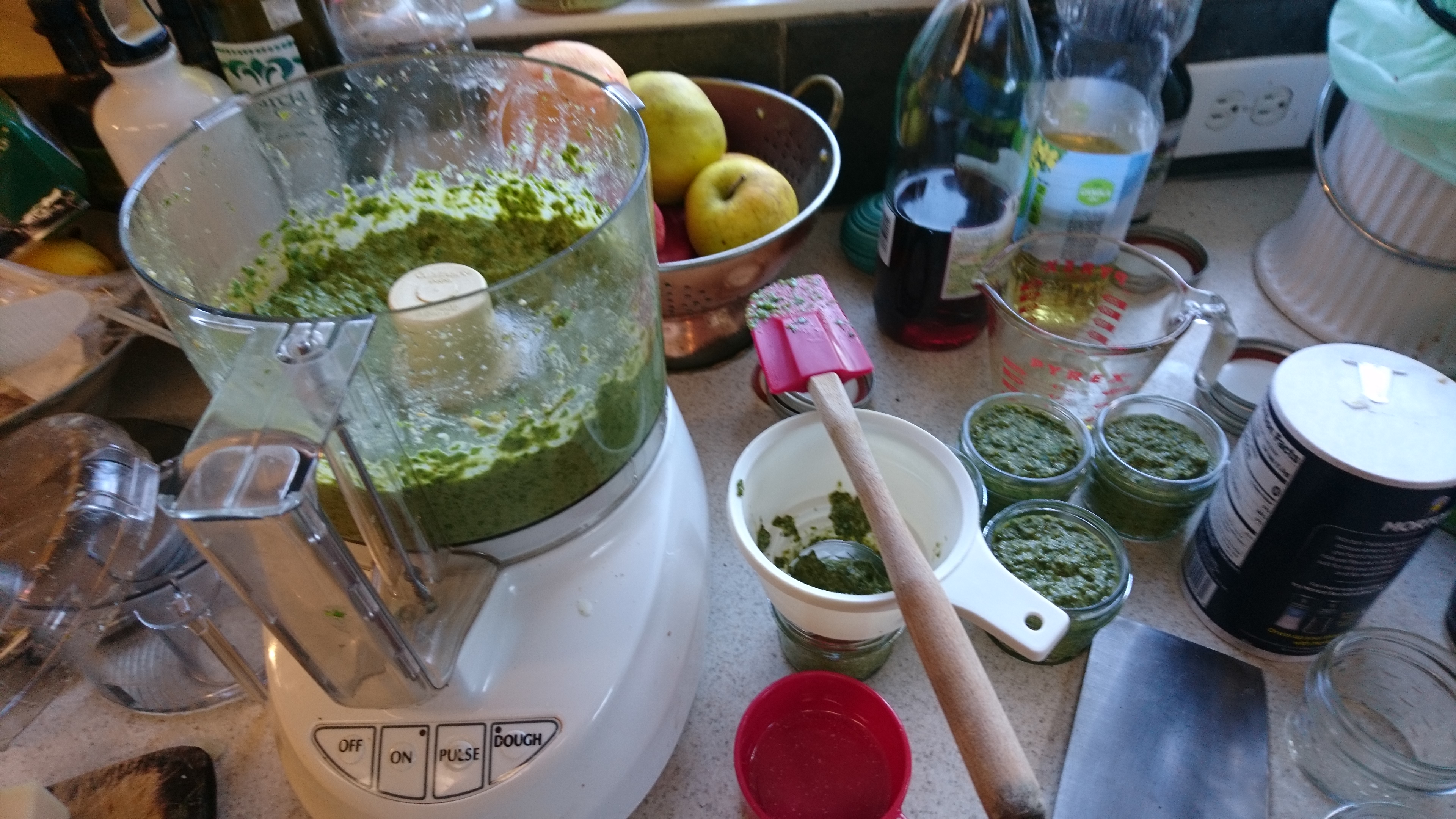 food processor, jars, and jar funnel in action