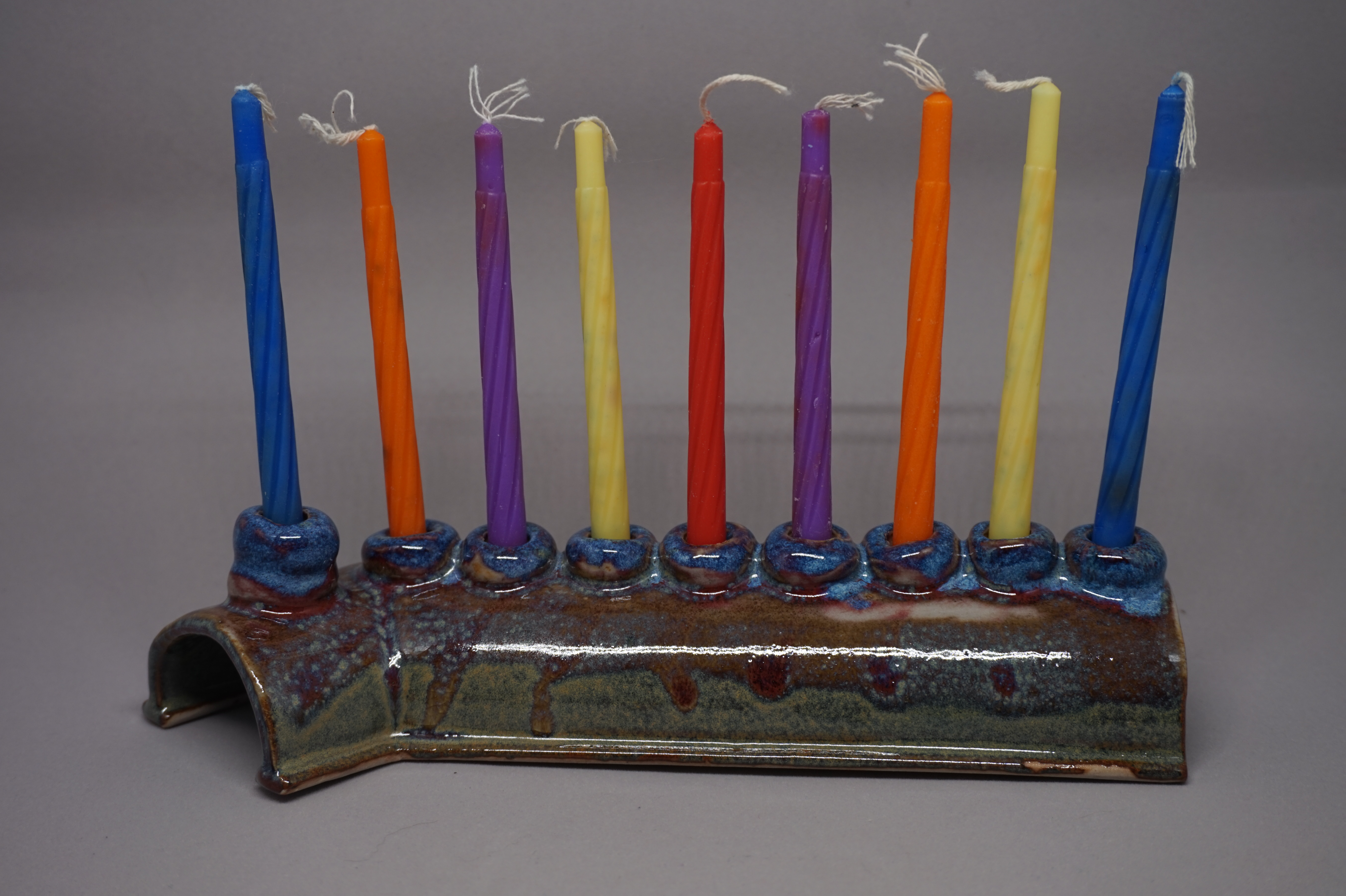 hanukkiah with 9 candles in it