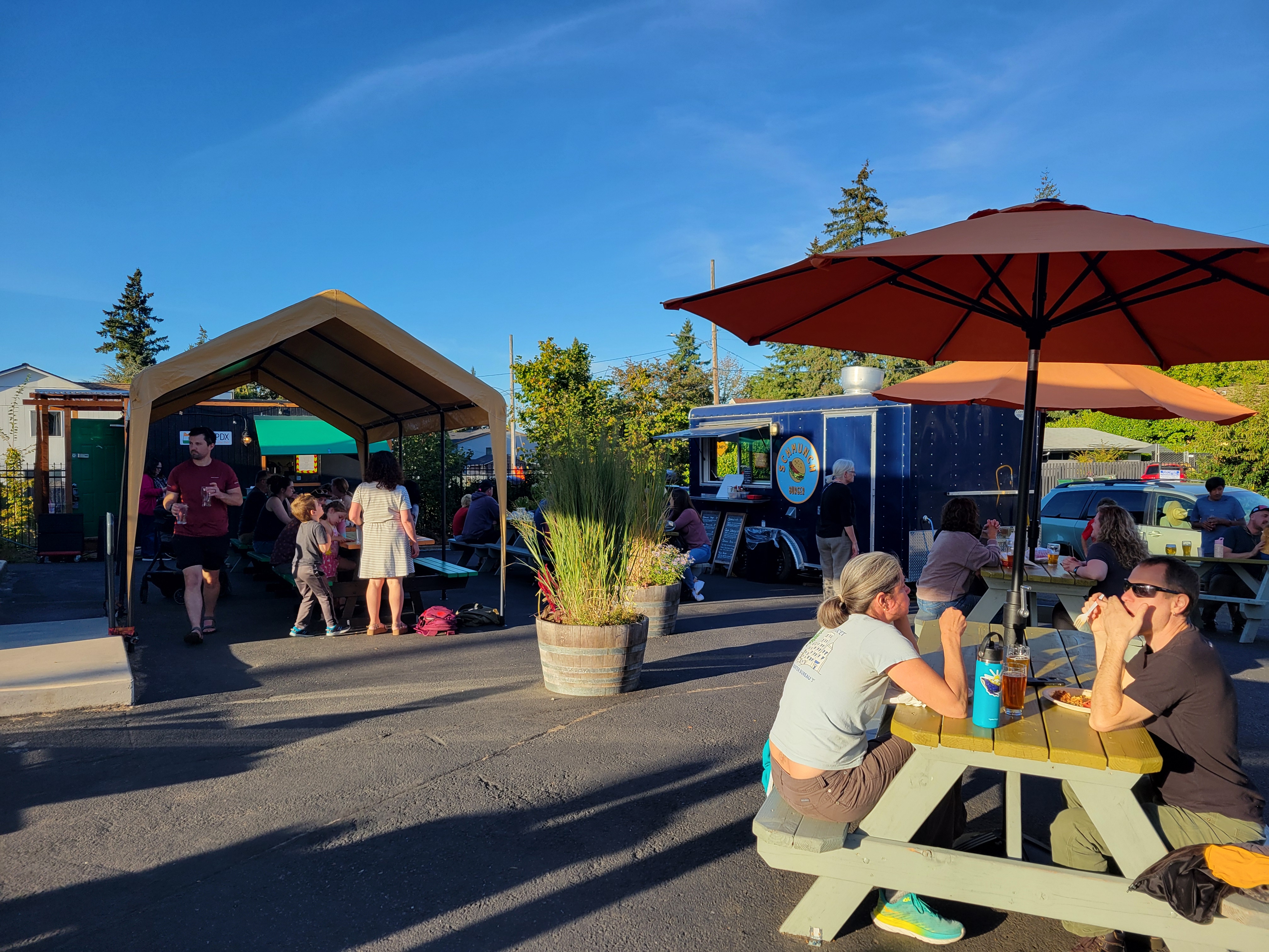 Photo of the food carts outdoor dining area on a summer day