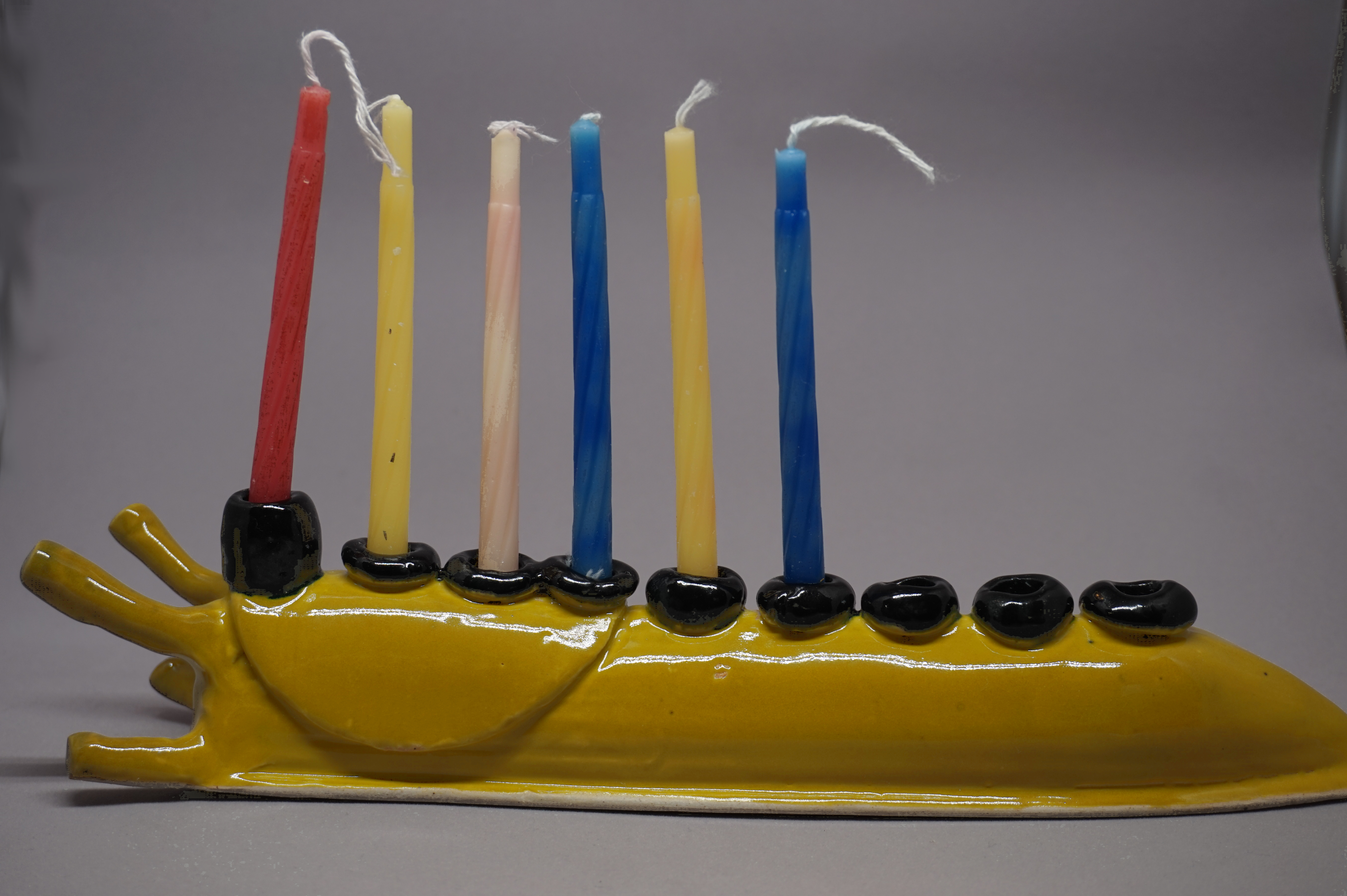 photo of a sluggakiah with a few candles in