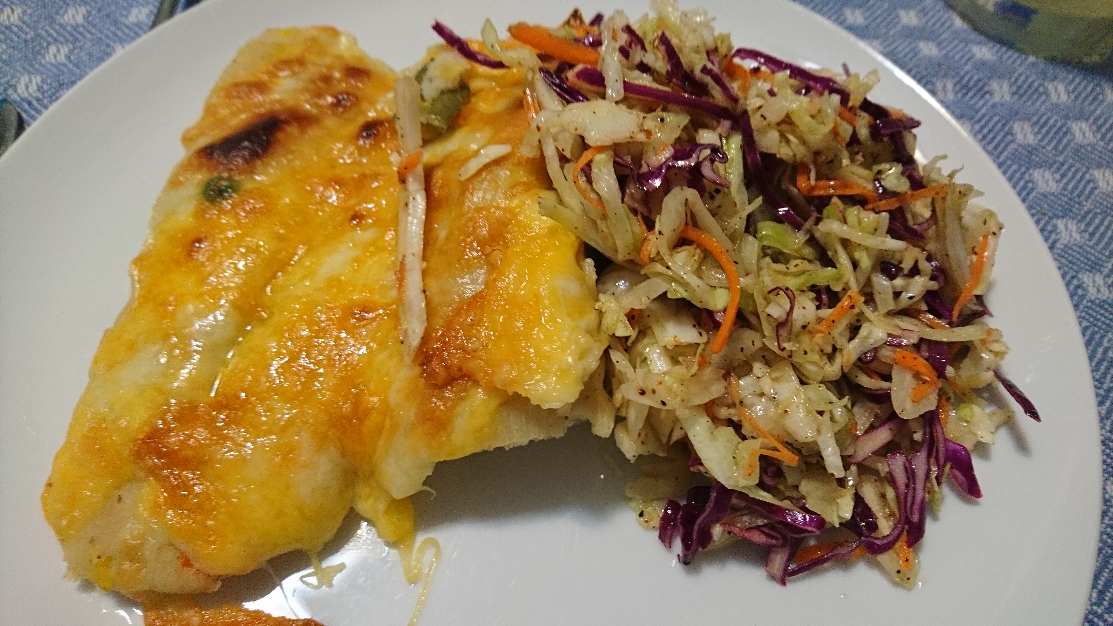 plate with two tamales and some slaw