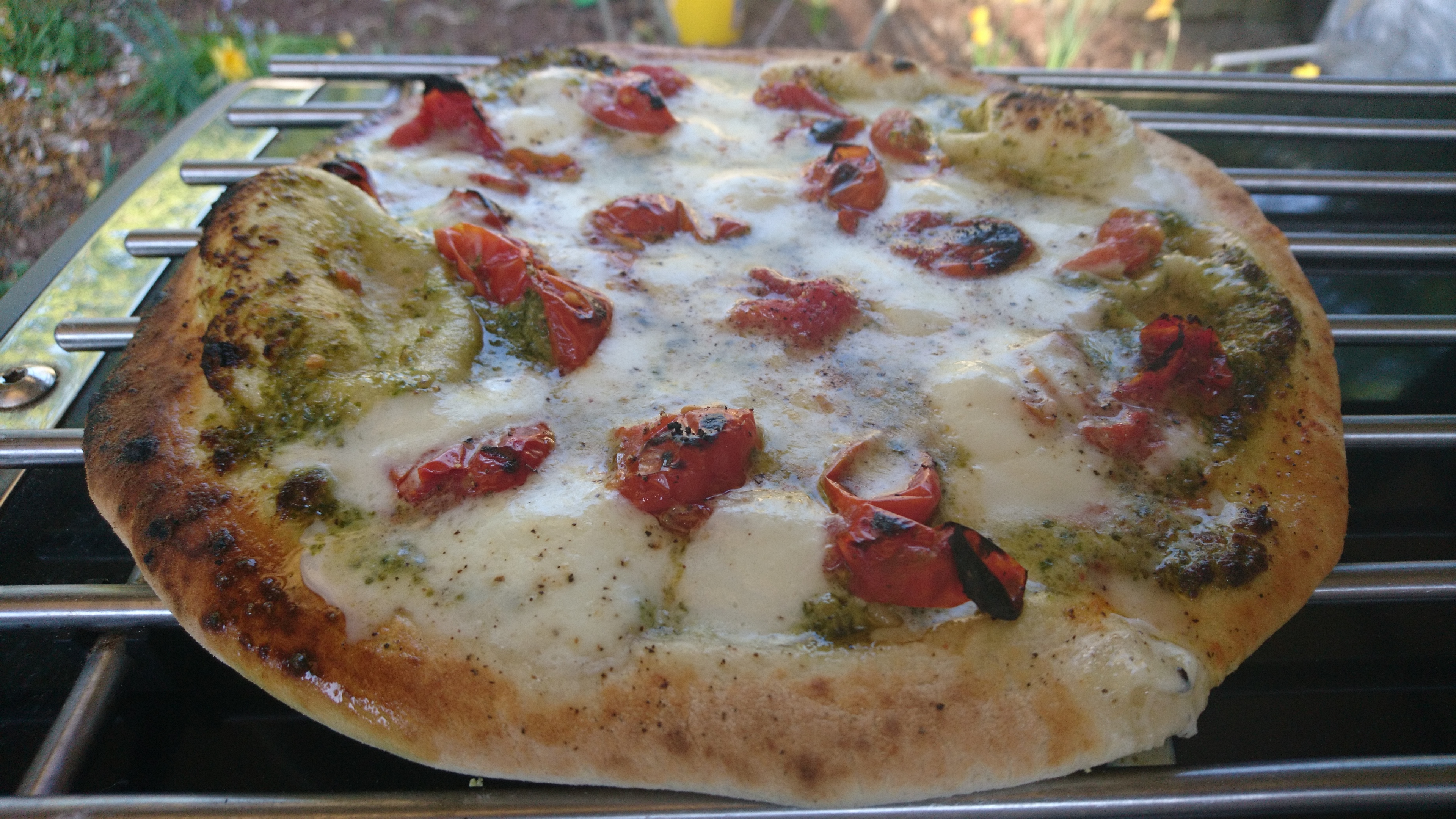 winter margarita pizza with crust spotting shown